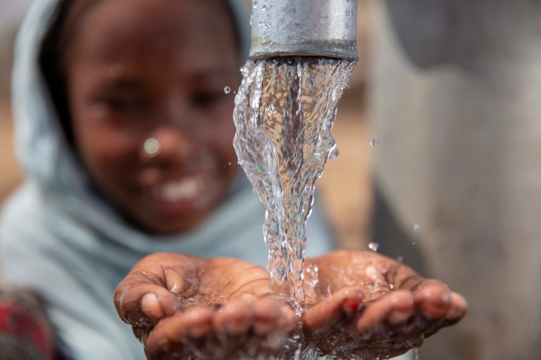 Koumra,,Chad,-,May,9,2019:,A,Child,Taking,Water